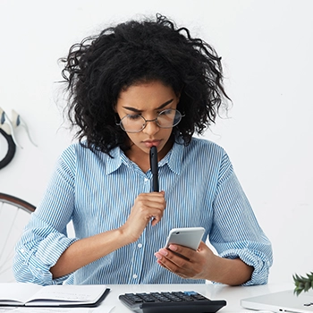 Woman thinking about Kentucky state income tax