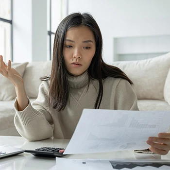 WOman thinking about LLCs for S-corp taxes