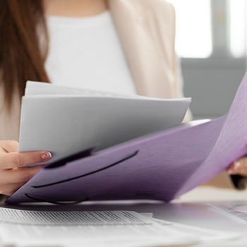 Woman reading document for multi member LLC