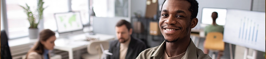 Black American smiling after utilizing grants