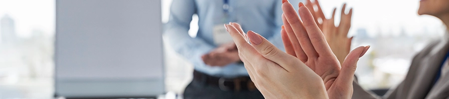 Clapping in the middle of a team meeting