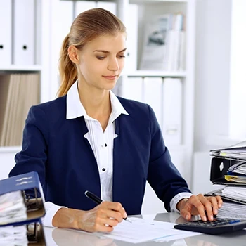 A woman working on some important documents