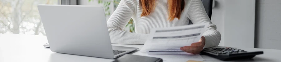 A woman reading some important documents