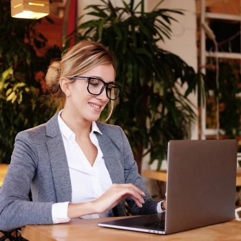 A woman using her laptop for work