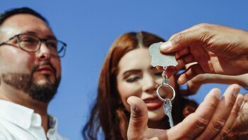 Couple getting the keys to their home