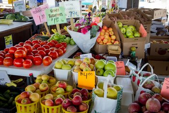 Fresh produce display at farmers market.