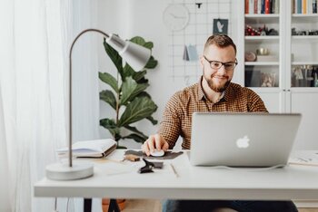 a_man_working_at_laptop