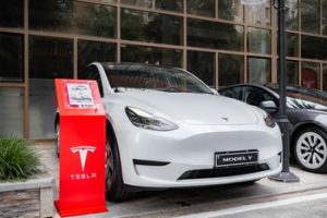 A white Tesla car