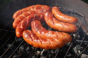 sausages on a grill