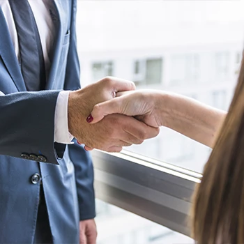 TurboTax worker on a handshake with client