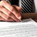 A man writing a Maryland LLC operating agreement