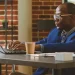 A Wyoming registered agent using his laptop inside an office