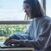 A person searching on their laptop for the best registered agent in Florida